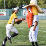 Blake Tweedt taking the field and fist-bumping Colt 45s mascot Homer, May 29th, 2022