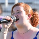 Singer Erin Van Mol performing the National Anthem (versus West Coast Kings on 2024-06-09 courtesy of Bill Wagner).