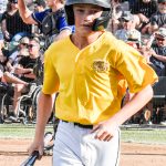 Batboy trots back to the dugout with bat in hand (versus the Fairfield Indians on 2024-06-16 courtesy of Bill Wagner).