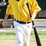 Redding Colt 45S batboy carrying a bat back to the dugout (versus the Novato Knicks on 2024-07-04 courtesy of Bill Wagner).